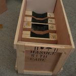 Bespoke design plywood case, with foam lined cradles and ends for shafts
