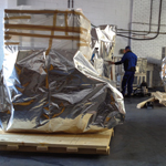On site vacuum packing for moisture control, prior to export case packing for sea freight